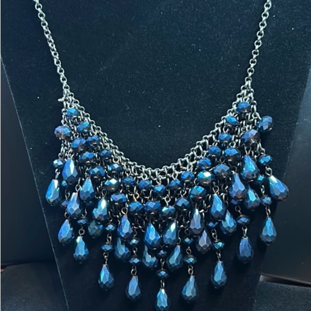 Rich Blue Multilayered Glass Beaded Bib Necklace on Gunmetal Colored Chain.